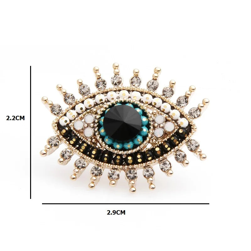 PENDRA Small Rhinestone Black Blue Eye Brooch