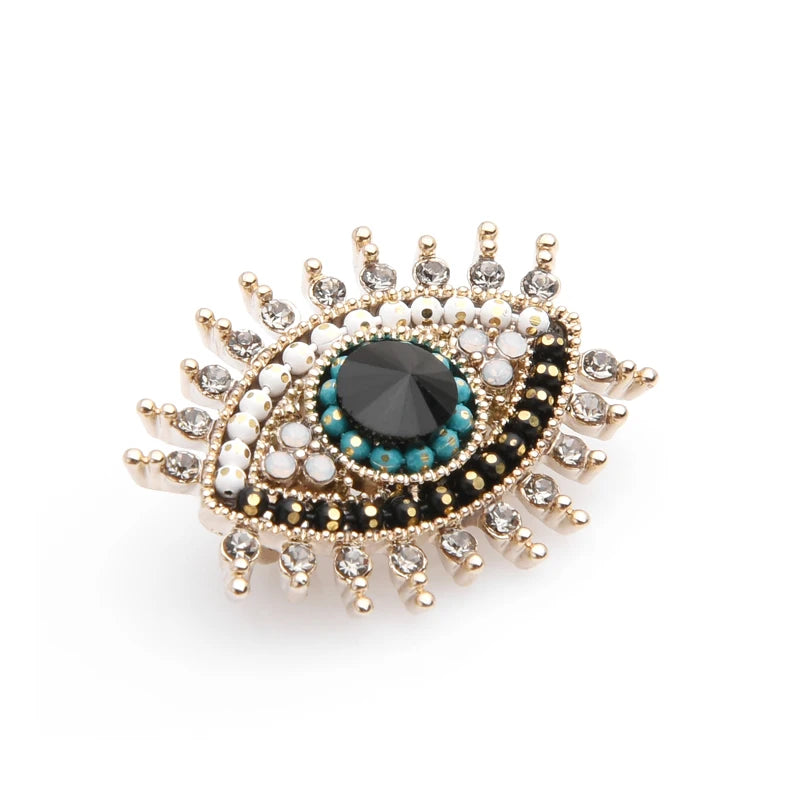 PENDRA Small Rhinestone Black Blue Eye Brooch