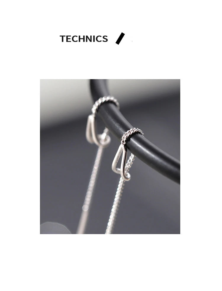 PENDRA Silver Tassel Chain Earrings