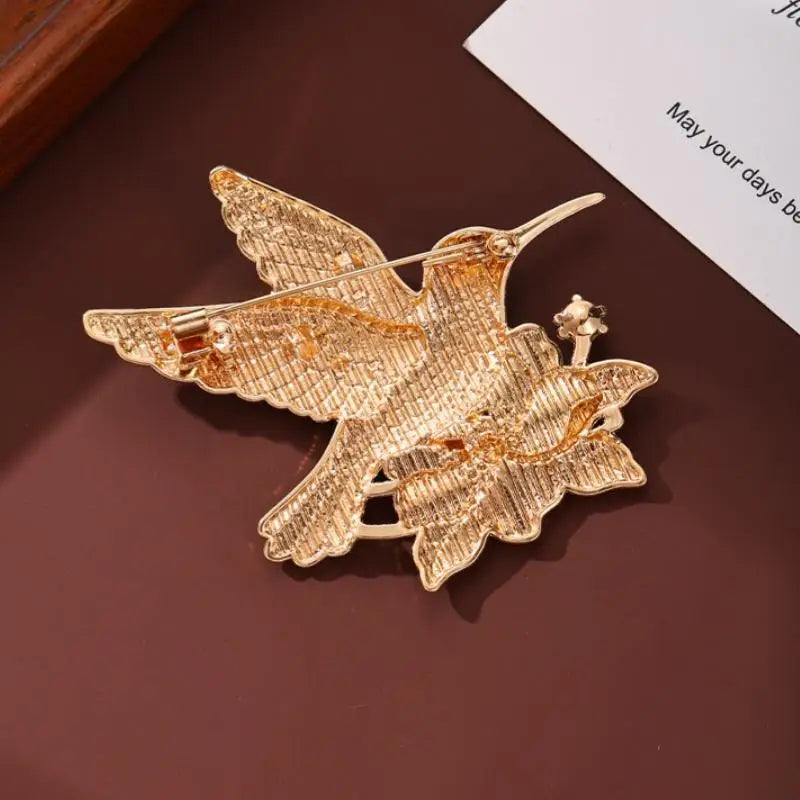 PENDRA Hummingbird Luminous Bird Brooch