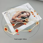 PENDRA Koralia Floral Boho Waist Chain Belt