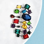 PENDRA Celestine Multicolor Rhinestone Tassel Brooch