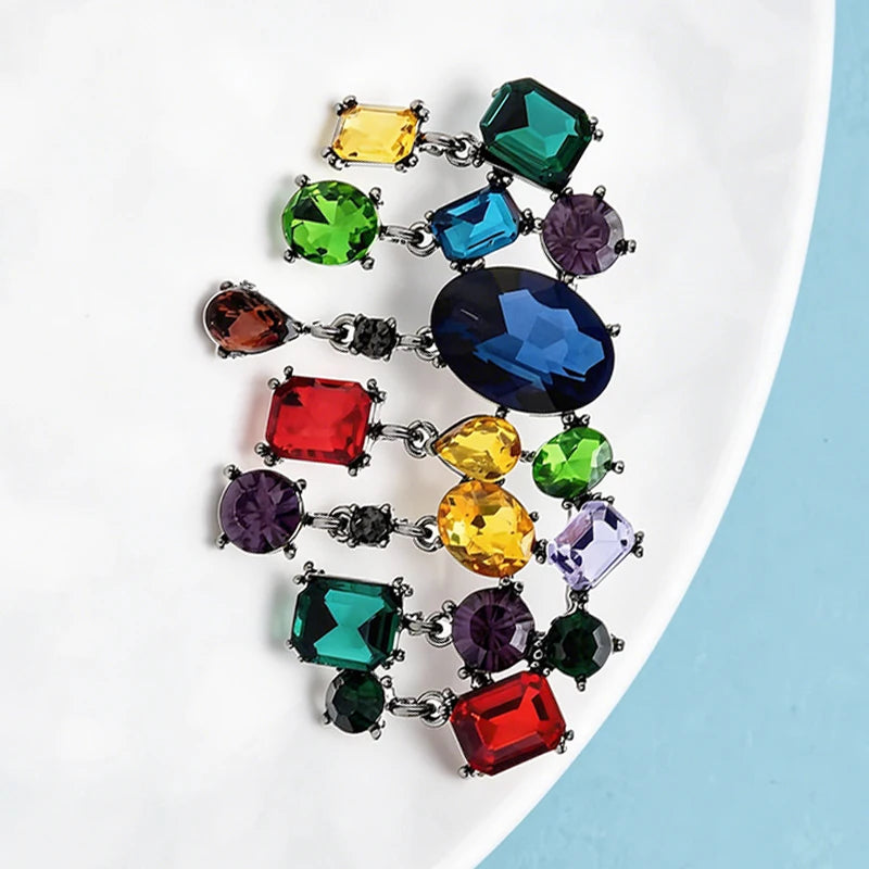 PENDRA Celestine Multicolor Rhinestone Tassel Brooch
