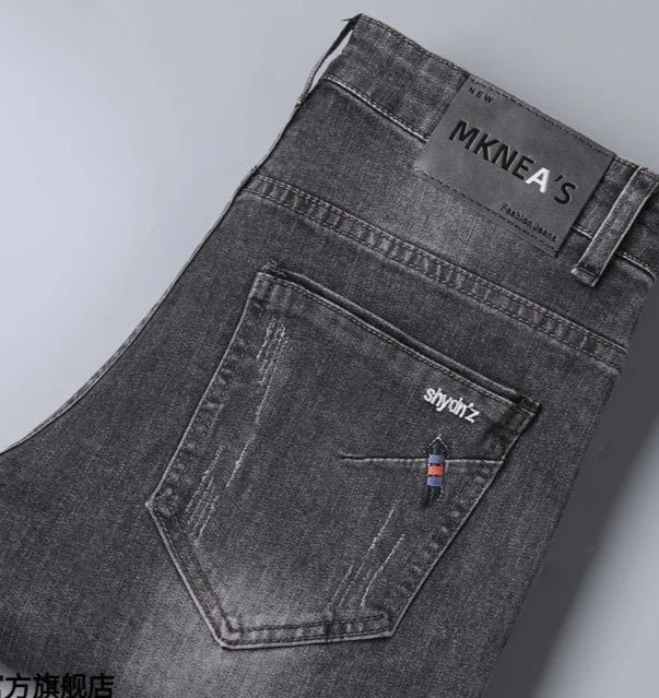 Men's Work Pants 2025 Spring Autumn Men's Casual Jeans New Slim Foot-bound Pants Explosive Street Luxury Washed Elastic Trousers
