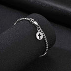 PENDRA Cross Charm Bracelet