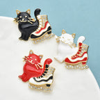 PENDRA Cat And Ice-skate Shoes Brooch