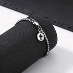 PENDRA Cross Charm Bracelet