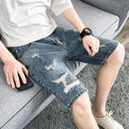 PENDRA Denim Washed Distressed Pants