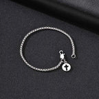 PENDRA Cross Charm Bracelet