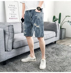 PENDRA Denim Washed Distressed Pants