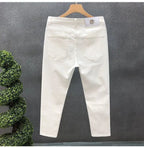 High-Quality Korean Street Men's Slim Jeans for Spring and Autumn with Denim Fabric and Casual Solid White Black Punk Trousers