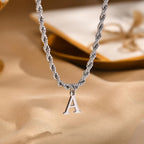PENDRA Letter Twisted Pendant Necklace
