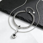 PENDRA Black Geometric Pendant Necklace