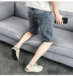 PENDRA Denim Washed Distressed Pants