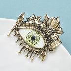 PENDRA Vintage Flower Eye Brooch