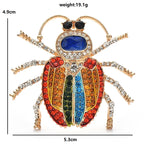 PENDRA Prismwing Rhinestone Beetle Brooch