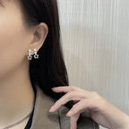 PENDRA Silver Stamp Star Earrings