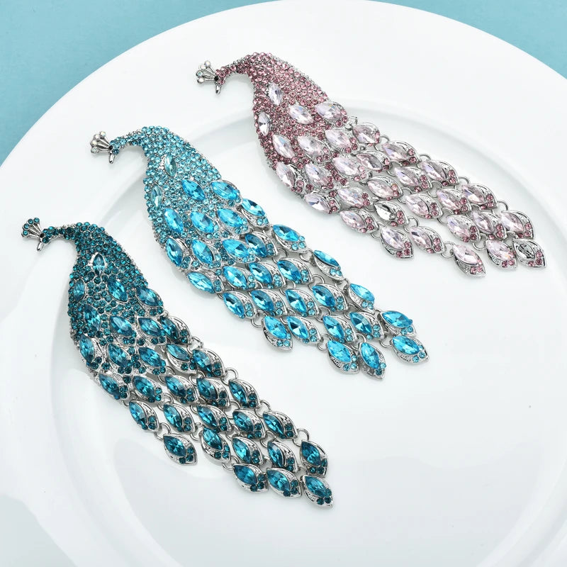 PENDRA Plume Rhinestone Tassel Peacock Brooch