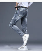 2025 Summer Ripped Jeans Men's Slim-fitting Small Feet Elastic Trousers Trendy Brand Fashion Scratched Patch Cargo Beggar Pants