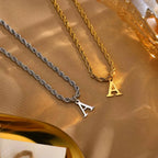 PENDRA Letter Twisted Pendant Necklace