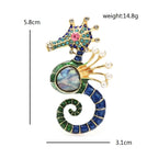 PENDRA Blue Rhinestone Shell Seahorse Brooch