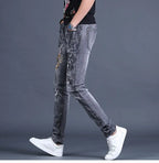 Spring and Autumn 2025 New Men's Jeans Gray Trendy Tiger Head Hot Diamond Printing Slim-fit Small Feet Trousers Men's Clothing