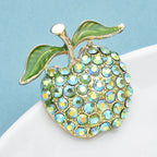PENDRA Appella Green Rhinestone Apple Brooch
