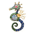 PENDRA Blue Rhinestone Shell Seahorse Brooch