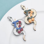 PENDRA Acrylic Snake Brooch