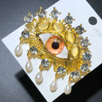 PENDRA Charming Blue Eye Brooch