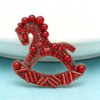 PENDRA Carousel Red-Bead Rocking Horse Brooch