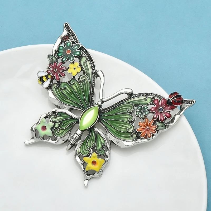 PENDRA Floral Butterfly Enamel Brooch