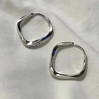 PENDRA Hollow Out Flower Hoop Earrings