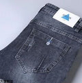 Men's Work Pants 2025 Spring Autumn Men's Casual Jeans New Slim Foot-bound Pants Explosive Street Luxury Washed Elastic Trousers