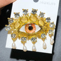 PENDRA Charming Blue Eye Brooch