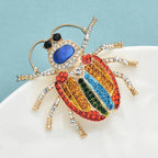 PENDRA Prismwing Rhinestone Beetle Brooch