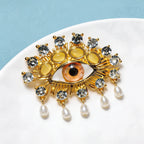 PENDRA Charming Blue Eye Brooch