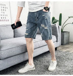 PENDRA Denim Washed Distressed Pants
