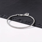 PENDRA Cross Charm Bracelet
