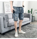 PENDRA Denim Washed Distressed Pants
