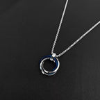 PENDRA Triad Titanium Steel Three-Ring Pendant Necklace