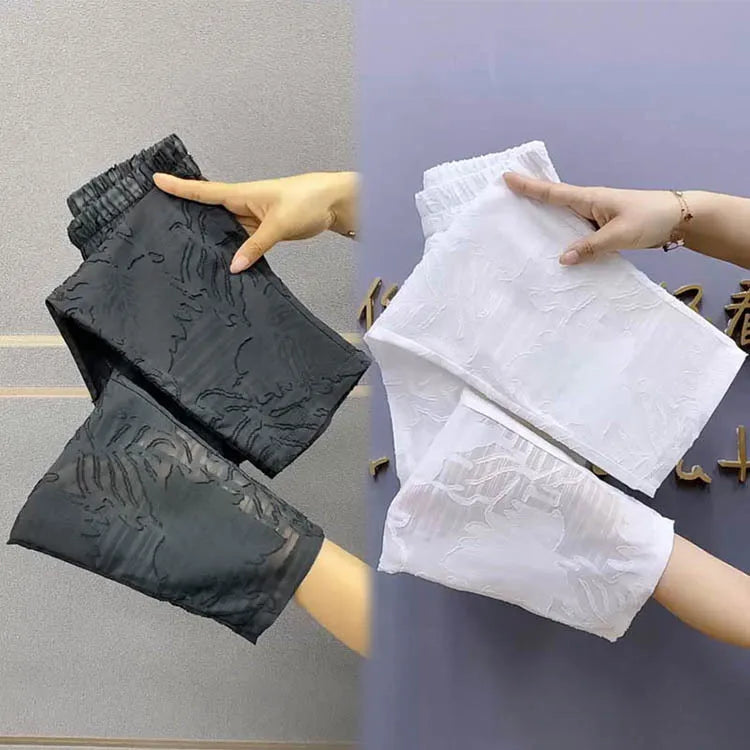 Lace hollowed out cropped pants women summer 2024 thin slim small foot Harlan pants loose and high waist versatile casual pants