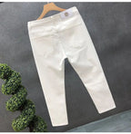High-Quality Korean Street Men's Slim Jeans for Spring and Autumn with Denim Fabric and Casual Solid White Black Punk Trousers