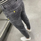 Luxury 2023 Men's High Street Korean Black Jeans with Zipper Distressed Hole Designer Youth Trend Slim-Fit Black Cotton Trousers
