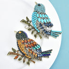 PENDRA Goldenwing Crystal Bird Brooch