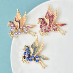 PENDRA Rhinestone Flying Elf Horse Brooch
