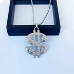 PENDRA Dollarburst Rhinestone Dollar Sign Pendant