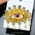 PENDRA Charming Blue Eye Brooch